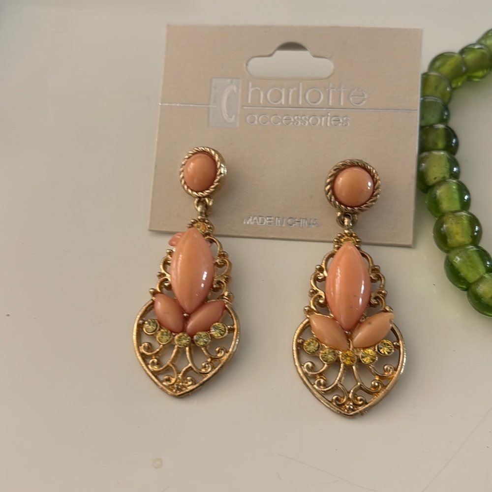 Two pairs of new earrings and a bracelet